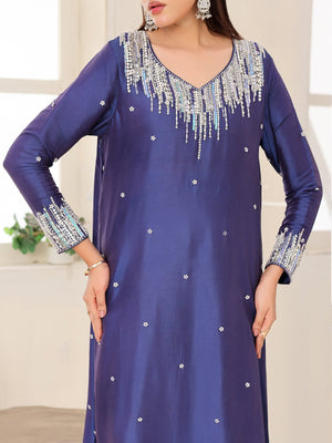 Royal Cascade blue glass-silk dress with cascading crystal embroidery