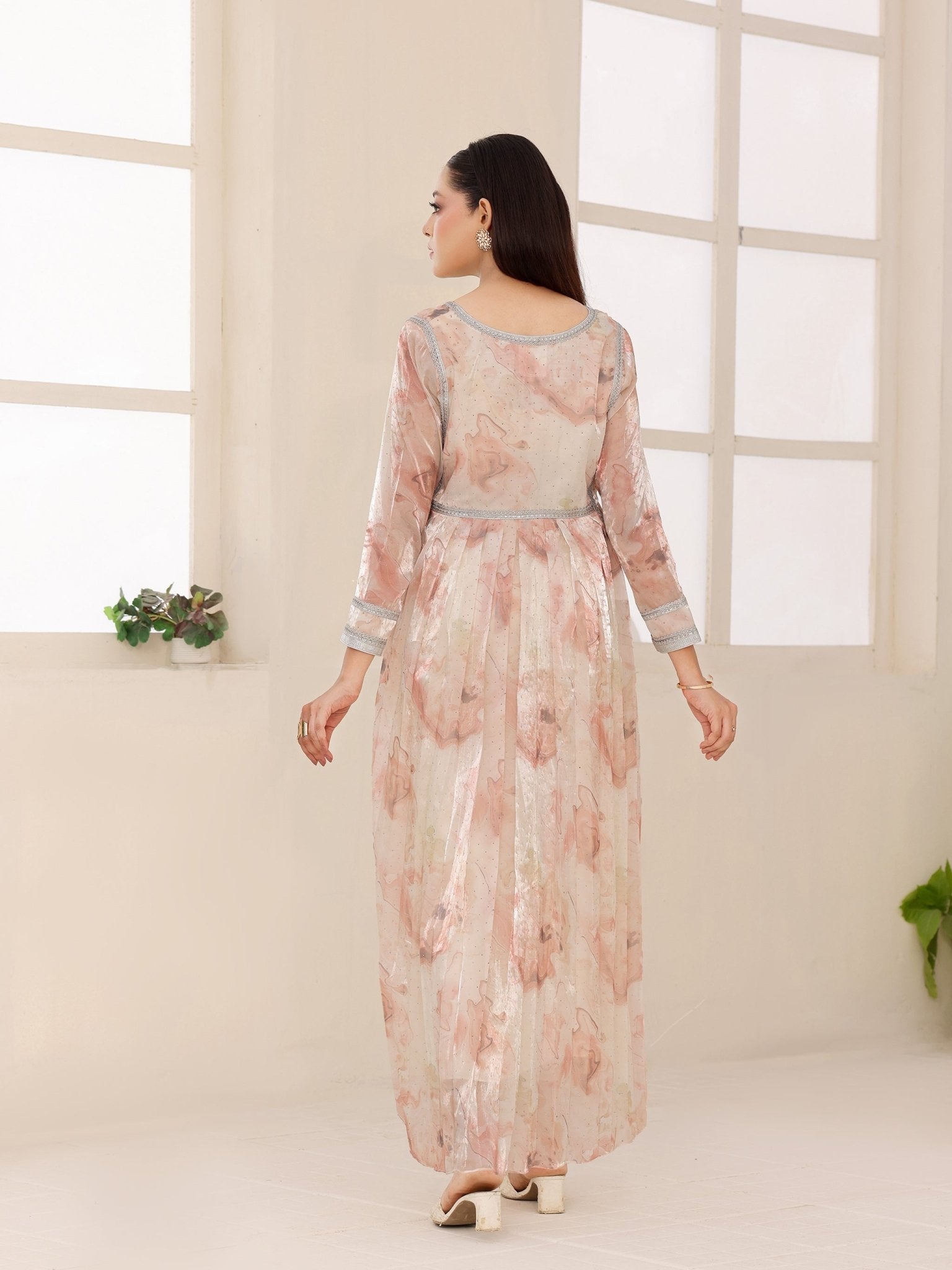 Silver-trimmed sleeves on Blush Alabaster dress