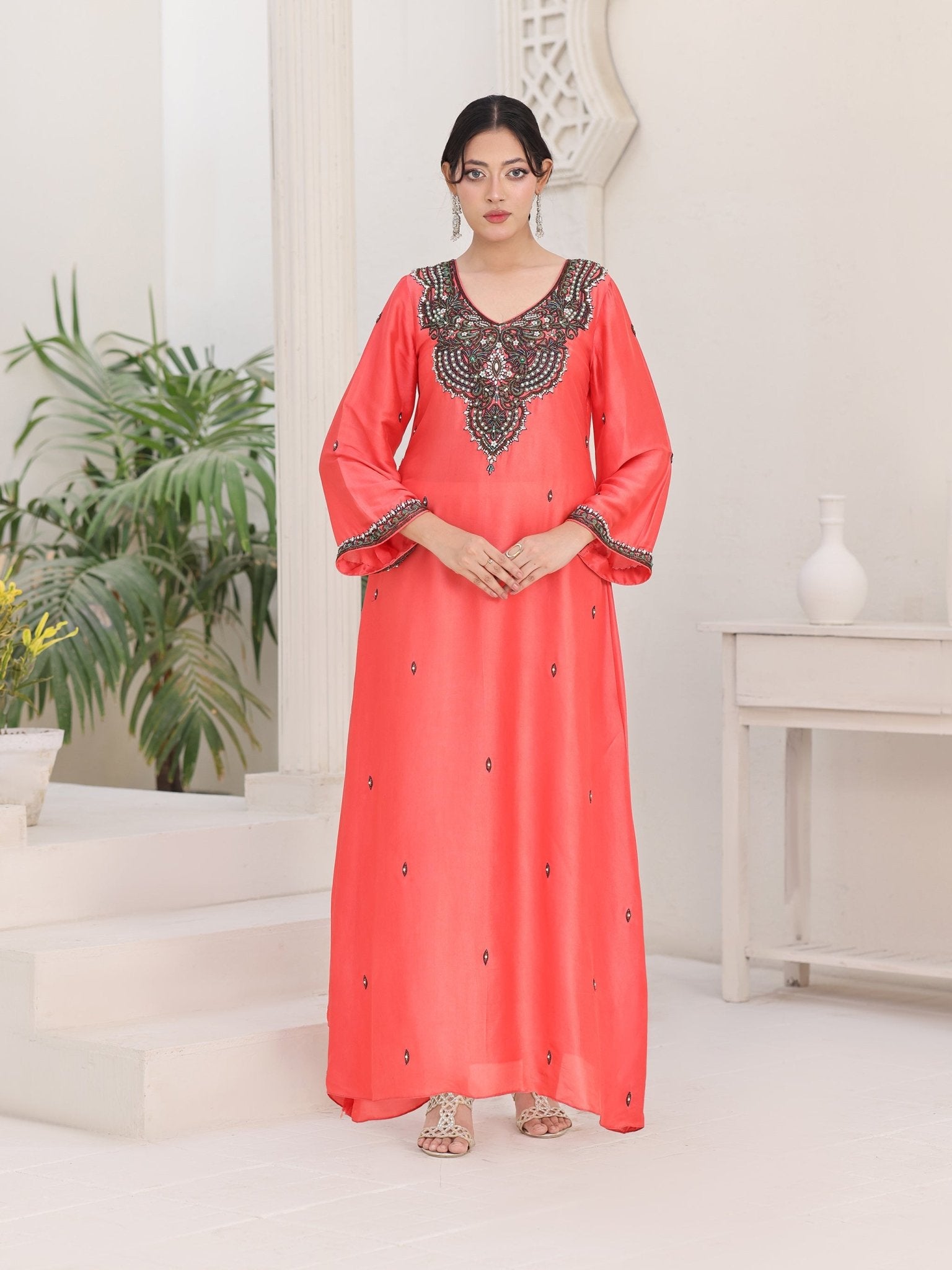 Coral Noir glass-silk dress with crystal-embellished neckline and embroidered cuffs