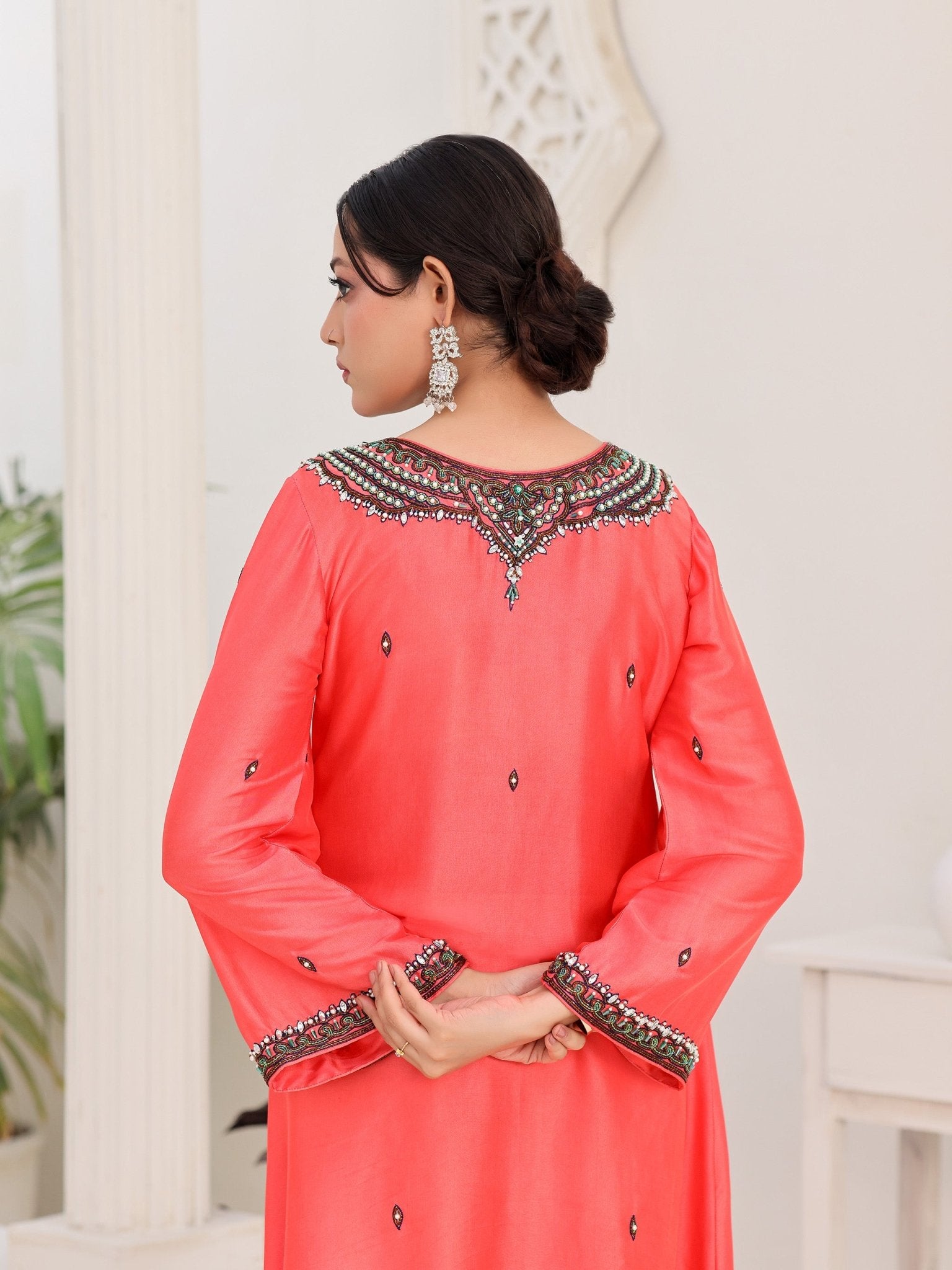 Coral Noir glass-silk dress with crystal-embellished neckline and embroidered cuffs