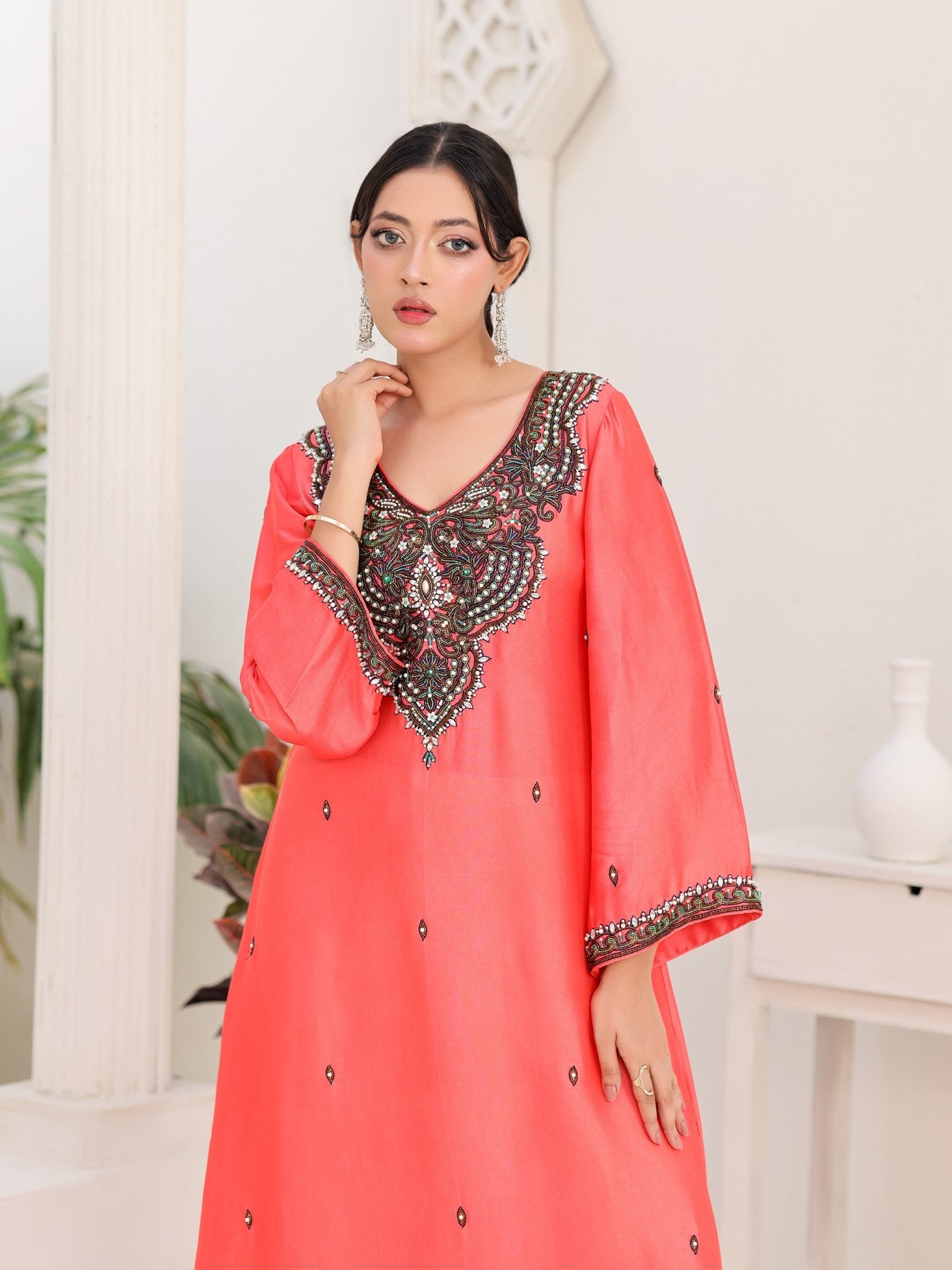 Coral Noir glass-silk dress with crystal-embellished neckline and embroidered cuffs